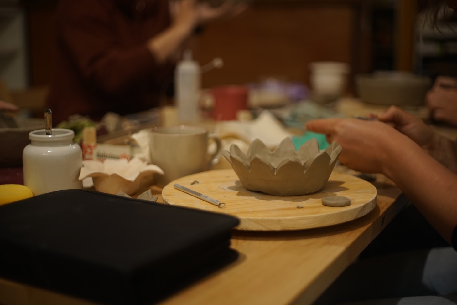 The studio at the end of the evening with finished modeled pieces